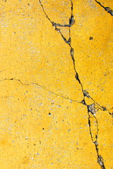 Close up of yellow wall  texture, with vibrant colors for creativity, imaginative backgrounds and ideas. Suitable for print, web, postcards, posters, flyers.