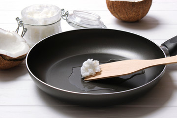 Frying pan and coconut oil close-up. fry in coconut oil.