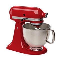 Red stand mixer on white background including clipping path.