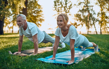 Senior couple doing sport outdoors