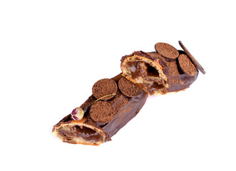 Delicious dessert on a white background. A fresh and tasty eclair is isolated on a white...