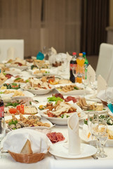 delicious dishes on the table in the restaurant. serving table.