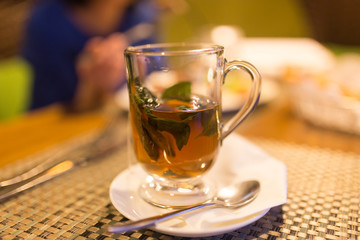A glass of mint tea in a restaurant