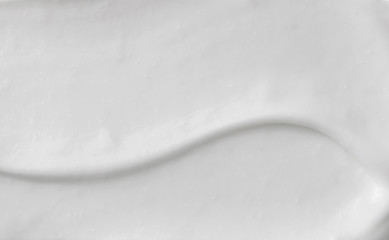 White texture of cosmetic body care cream background