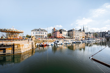 Landscape view on the beautiful harbour with yachts and old buildings in Honfleur, famous french...
