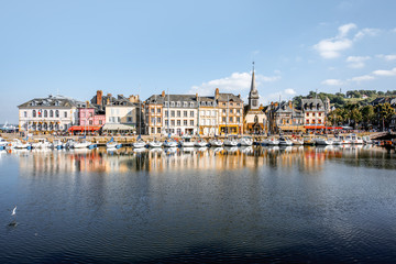 Landscape view on the beautiful harbour with yachts and old buildings in Honfleur, famous french...