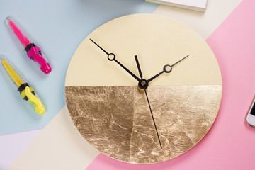 Creative summer top view with yellow wall clock. Flat lay