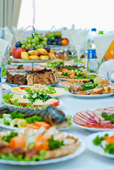 delicious dishes on the table in the restaurant. serving table.
