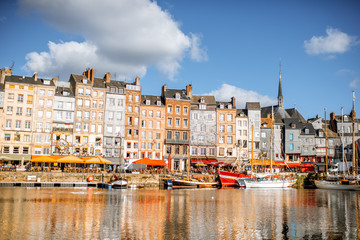 Landscape view of the harbour in Honfleur, famous french town in Normandy, during the morning light