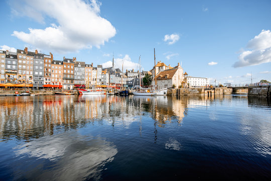 Landscape view of the harbour in Honfleur, famous french town in Normandy, during the morning light