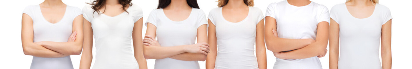 clothing design and female unity concept - group of women in blank white t-shirts