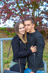 Funny couple laughing with a white perfect smile