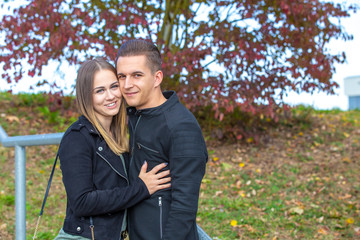 Funny couple laughing with a white perfect smile