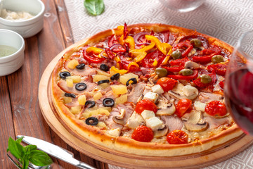 Delicious fresh pizza served on wooden table