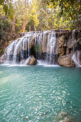 Fototapeta na wymiar Vertical Erawan waterfall