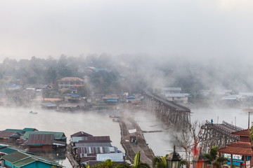 Floating Mon village and bridge at dawn