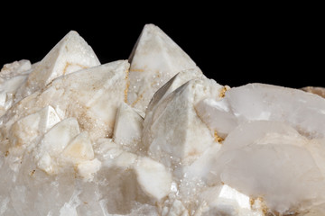 Macro mineral stone Snow quartz with calcite on a black background