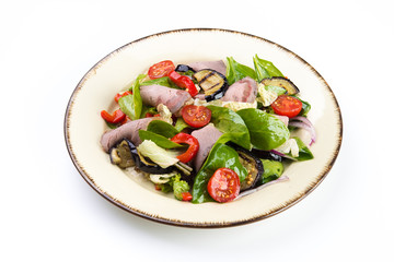 Fresh salad with ham, red pepper, eggplant and basil leaves