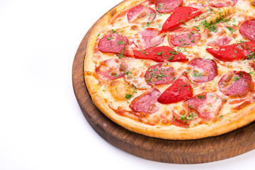 Spicy tasty pizza with salami and red pepper