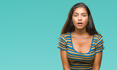 Obraz premium Young beautiful arab woman over isolated background afraid and shocked with surprise expression, fear and excited face.