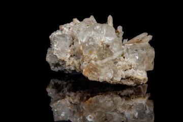 Macro mineral stone fluorite with quartz against black background