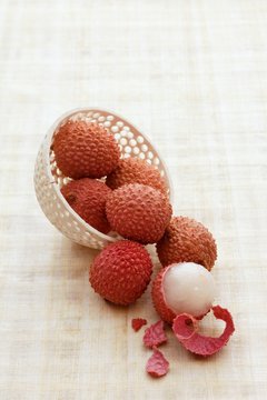 Lychees, one half peeled