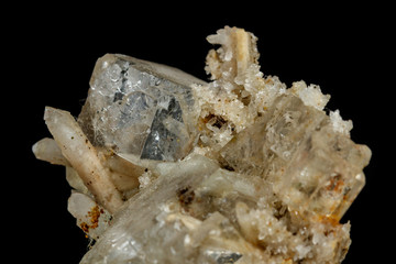 Macro mineral stone fluorite with quartz against black background