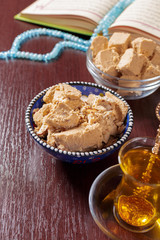 Tasty halva with tea on the table