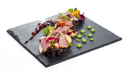 grilled meat : beef ( lamb ) garnished with tomatoes ,lettuce