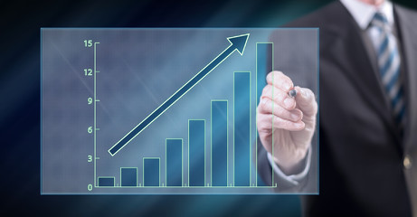 Man touching a financial growth concept