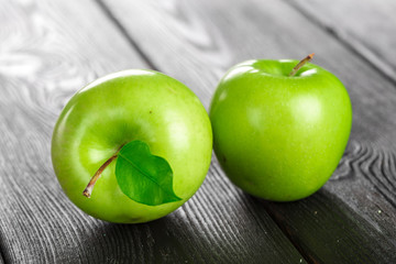 green apple on wooden background
