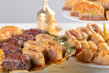 Traditional eastern arabic dessert Baklava with Turkish honey and walnuts, selective focus. Copy space