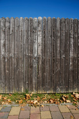 Fototapeta premium brown wooden gate in autumn scenery