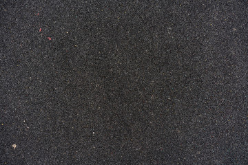 Black rubber tile floor background