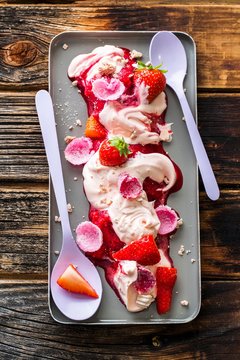 Strawberry Eton Mess with strawberry sorbet and candied rose petals