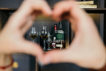 Fototapeta na wymiar Symbol heart and alcohol. love of alcohol