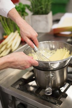 Bechamel sauce being made