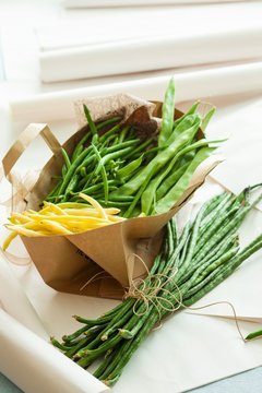 Various types of beans in paper bag