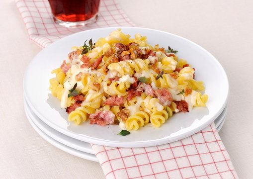 Fusilli with crescenza and ham