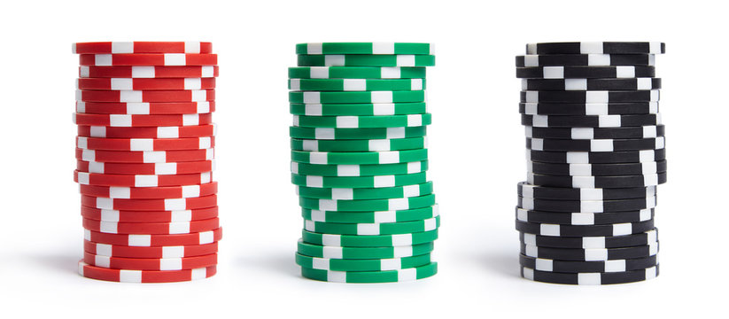 A stacks of casino chips isolated on white background. Collection.