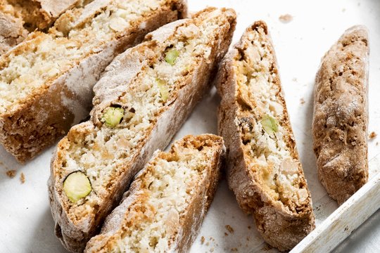 Close up of biscotti with pistachios on tray