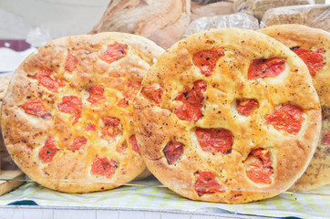 Traditional italian focaccia with cherry tomatoes