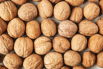 Unpeeled walnuts as background
