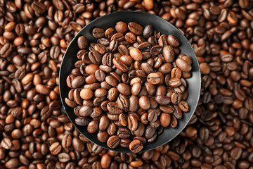 Plate on roasted coffee beans