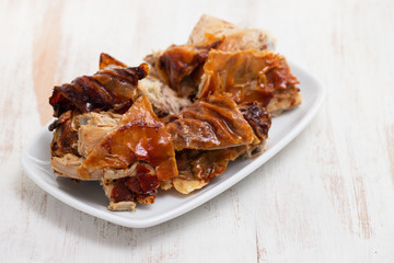 roasted pork on white dish