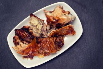 roasted pork on white dish