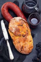 Fototapeta na wymiar cornbread with chourico and red wine