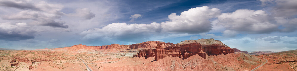 Fototapeta premium Panoramic aerial view of beautiful canyon and mountains on a beautiful sunny day, Utah