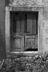 An old door in the historic hill village of Oprtalj in Istria, Croatia
