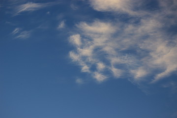 blue sky with quaint clouds